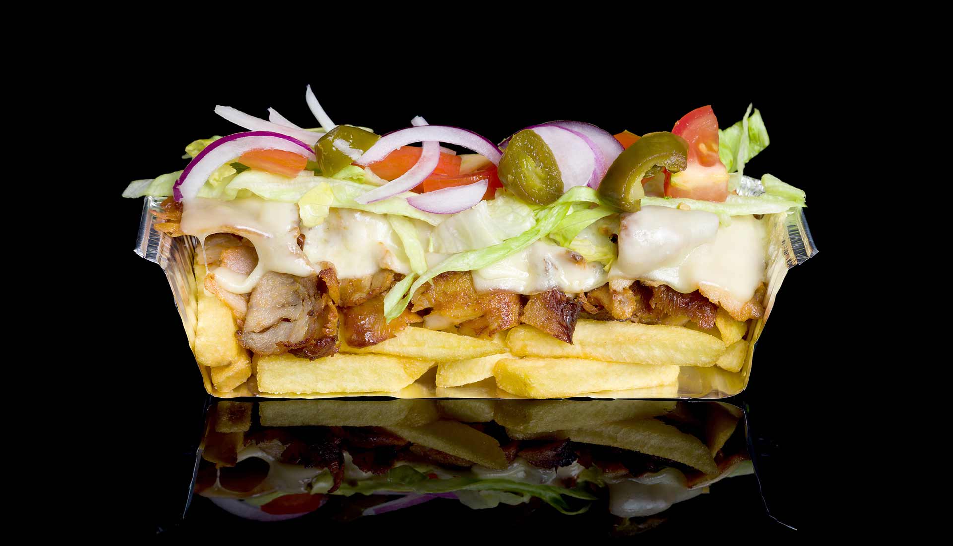 DÉ KAPSALON!